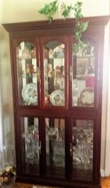 curio with glass shelves