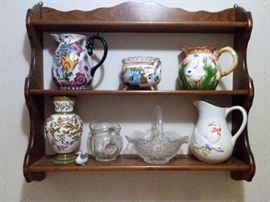 wooden shelf, pitcher collection