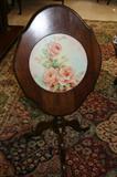 Antique Table with hand painted porcelain circle. Beautiful Condition. Works perfectly. Priced at 65.00
