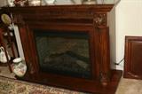 Electric Fireplace; W/Remote; Large; Solid Wood; Carved; Works Great; 4 years old. Original Price 1300.00 Priced to sell at 550.00 Excellent Condition.