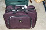 Excellent condition overnight bag w/pull bar. Has 3 compartments w/toiletries area.