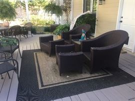 Beautiful resin chairs, ottomans, and table. Gorgeous cushions and pillows go with this set.