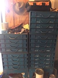 Welding boxes, filled with an assortment of tools, parts, etc.