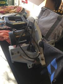 Table saw, dust catcher, and table (not shown)