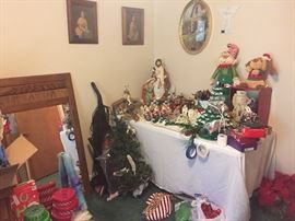 Lots of Christmas decor, mirror, vintage pictures