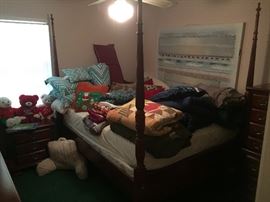 Queen size bed with posts and end table, part of matching bedroom suit