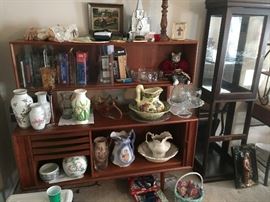 Mid-century furniture piece, several pitchers, books and other decor including display shelf