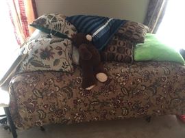 Twin size bed, decorative pillows