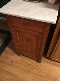 Small marble top cabinet