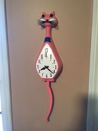 Plastic pink cat clock