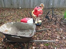 Wheel barrow, cooler, bench frame, & M&M display