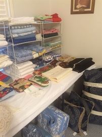 Lots of linens and decorative pillows