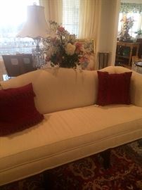 White formal camel back sofa