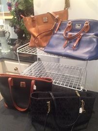  Some of the 30-40  purses including Dooney Bourke and Michael Kors 