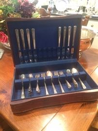Silver plate place setting for 8 (in chest); a set of sterling is also available