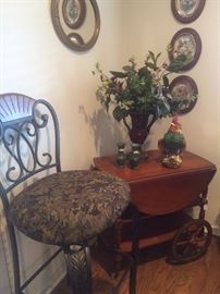One of several bar stools; maple tea cart