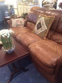 Brown leather sofa; retangular coffee table