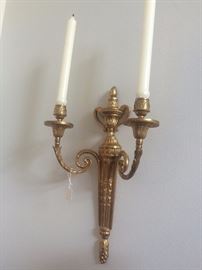 One of two matching wall sconces