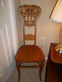 antique oak north wind face chair