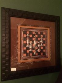 One of two chess style framed art
