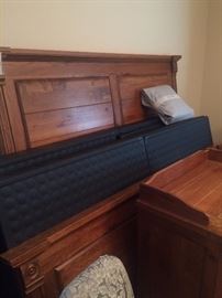 Good-looking king bed has 2 matching nightstands.