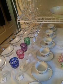 Crystal; colored glassware; cups & saucers
