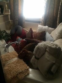 Many decorative pillows