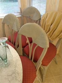 Small kitchen nook table and 4 chairs. Table glass top