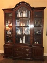 Kittenger breakfront bottom shelf, middle, Lladro retired "Here Comes the Bride", 15" tall