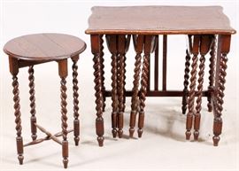 Lot#97, SUITE OF FIVE NESTING TABLES, H 26 1/2" L 30 1/4", D 21"Late 19th/early 20th century. Comprising: four small tables nesting into larger table with a carved design at the edge of the top.  All the smaller tables having spiral design gate legs with scissor stretchers and drop leaves allowing them to store under the larger table. Measurements are for largest table.