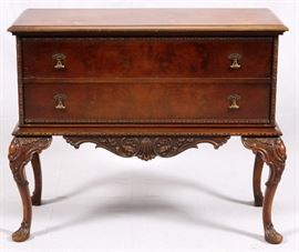 Lot#108, GRAND RAPIDS, CARVED WALNUT SERVER, H 33", W 45", D 20"Having two full width deep drawers, with hanging brass pulls. Contoured carved skirt and cabriolet legs.