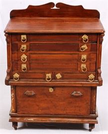 Lot#112, VICTORIAN WALNUT SILVER CHEST, H 39", W 29", D 19"having a contoured back panel, 4 stacked full width drawers above two narrow half width drawers. Bottom section has a large full width drawer. Gilt ring pulls on the drawers. Resting on casters.