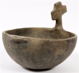 Lot#121, HOPE WELL POTTERY BOWL, H 7 1/2"A round pottery bowl with a spout and head form accent handle.  Measures H.7 1/2" x 10".  Found in 1962  by Arnold Moore.