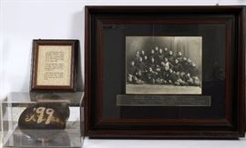 Lot#275, UNIVERSITY OF MICHIGAN, ORIGINAL 1899 GAME USED FOOTBALL AND BLACK AND WHITE PHOTO OF THE TEAM. A team photo and signed football from the 1899 football game between the University of Michigan and Pennsylvania, signed by Captain Allen C. "A.C." Steckle, mounted in a Plexiglas case. The football measures approximately H.9 1/2" x 8".  The photo measures 12 1/2" H x 16 " W without the frame.  Framed and Matted under glass.  These items were purchased from the legendary Pretzel Bell in Ann Arbor, MI.   The University of Michigan Historical Sports Collection of Frederick C. Matthaei,Jr.   Estate of Frederick C. Matthaei, Jr.