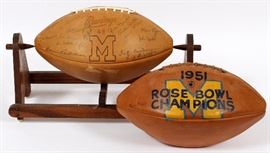 Lot#277, UNIVERSITY OF MICHIGAN 1951 ROSE BOWL CHAMPIONSHIP AND 1956 TEAM SIGNED FOOTBALLS. 1951 University of Michigan Rose Bowl Championship Team Signed Football including: Fritz Crisler, Bennie Oosterbaan and others.  1956 University of Michigan Team Signed Football including Benny Oosterbaan, Fritz Crisler. These items were purchased and or given to Frederick C. Matthaei, Sr. (Per family). Estate of Frederick C. Matthaei, Jr.