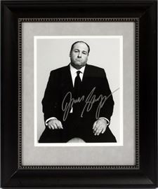Lot#309, JAMES GANDOLFINI, AUTOGRAPHED, BLACK AND WHITE PHOTOGRAPH, H 10", W 8"Autographed black and white photograph of the late James Gandolfini, star of the Sopranos television series. Signed in silver Sharpie. Framed and matted under glass. Includes certificate of authenticity on verso.