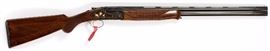 Lot#332, CAESAR GUERINI, ITALIAN, OVER AND UNDER, 20 GAUGE, SHOTGUN, #126457, 2011, L 28" BBL. Caesar Gureini "Magnus Grouse Limited" model, having blued 28" barrels, case hardened receiver with gold inlays of quail and pheasant on underside forward of trigger guard. Gold trigger. Walnut checkered stock and forearm. Signed next to trigger: "Bottega C. Giortanelli" and "Made In Italy" left side of trigger guard. Includes five choke tubes and wrench with plastic storage box, soft gun sock inscribed 'Caesar Guerini'. Along with brochure. All set in a red velvet lined hard case with combination locks.