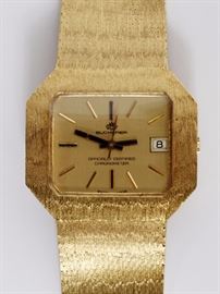 Lot#1019, A BUCHERER 18KT YELLOW GOLD GENTLEMEN'S WRISTWATCH, C. 1980'S. A Bucherer 18K yellow gold automatic gentlemen's wristwatch. Swiss, 1980's. The champagne toned dial with hourly applied batons, stamped "0.750", "1808", and a crown mark to back, fitted to an integral weave bracelet with ladder clasp. Having original box. The watch face measuring 1" and the watch case measuring 1 1/2". Wrist measuring approximately 6 7/8". Weighing approximately 99.8 grams.