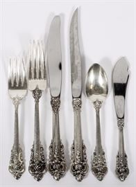Lot#1026, WALLACE 'GRAND BAROQUE' STERLING FLATWARE (SERVICE FOR 12), 55 PIECES. Including 12 dinner knives, 8 1/2", 12 dinner forks, 7", 12 salad forks, 12 teaspoons, 6 steak knives, and 1 master butter knife.   Weighs 56.6 troy ounces total.  A total of 55 pieces.