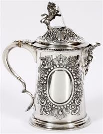 Lot#1033, CHARLES BOYTON STERLING TANKARD, 1900 H 10", W 9"Charles Boyton (II), London, 1900. An overall repousse design with two medallions, surrounded by a floral and acanthus leaf motif and a lion and shield finial. Impressed maker's marks to side. Approximately 29.45 troy ounces.

Provenance: Estate of Frederick C. and Malora Matthaei.
