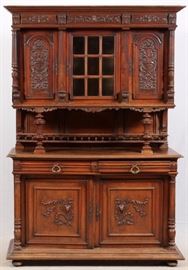 Lot#1073, RENAISSANCE REVIVAL WALNUT BUFFET, 1900 H 7' 4", L 5', D 21"Double doors at top with glass window, serving counter drawer and double doors at base.  Full size H 7' 4 3/4", L 5', D 21 1/2".