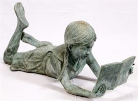 Lot#1094, CAST BRONZE GARDEN SCULPTURE H 20" L 42" GIRL READING. Bronze patina, lost wax bronze cast.