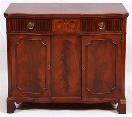 Lot#1111, BERKEY & GAY MAHOGANY SERVER, C. 1940'S H 33", L 38", D 18"Berkey & Gay, Grand Rapids, circa 1940's. A mahogany server. Having shaped top above two drawers and central floral inlay two upper drawers and two lower molded cupboard doors.