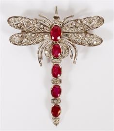 Lot#2051, ART DECO DRAGONFLY PIN/BROOCH 18KT WHITE GOLD WITH FIVE OVAL RUBIES & MELEE DIAMONDS L 2" Marked on the clip-pin.   See additional color pictures.
