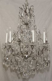 Lot#2233, SCHONBEK, 8 LIGHT CRYSTAL CHANDELIER, H 44", DIA 30" Scrolling arms are silver plate; designed by Stanley.  Purchased from the House of Lights, Shelby Twp., MI.