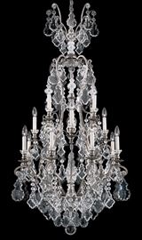 Lot#2235, SCHONBEK TWENTY-FIVE LIGHT CRYSTAL CHANDELIER, C. 2000, H 72", DIA 36" Hung with crystal prims.