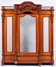 Lot#2262, NORTHER EUROPEAN STYLE CARVED MAHOGANY FIGURAL CABINET, H 99", W 84", D 28" Male and female busts in the pediment.