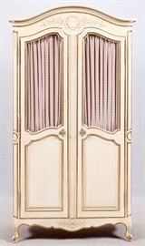 Lot#2258, KINDEL ANTIQUE WHITE AND GOLD LEAF ARMOIRE, H 79", W 42" D 18" Two doors with inset brass grill work in upper panels. Interior fitted with three shelves and four drawers.