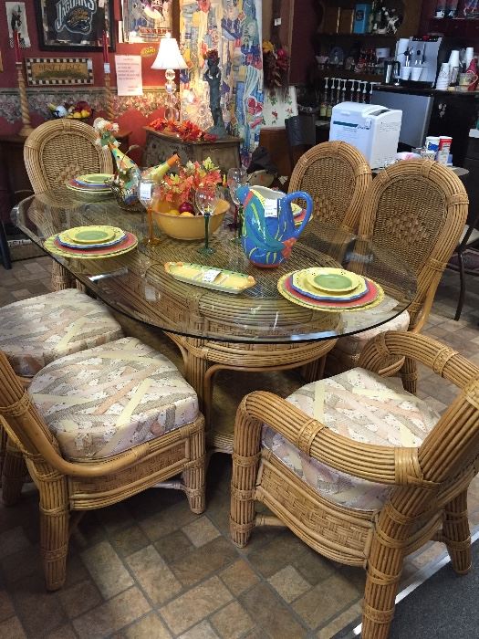 Bamboo and wicker 6 seater dining table set with heavy beveled glass top.