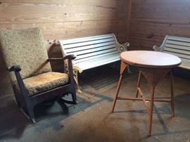 Cast iron & wood slat park benches; upholstered rocker; painted wicker table.
